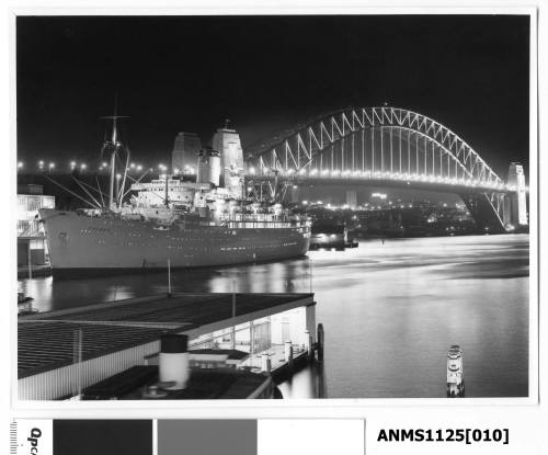 A night time image showing SS CHUSAN, a P&O passenger liner, moored starboard side to the International Terminal wharf at Circular Quay.