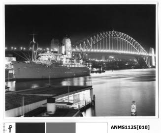 A night time image showing SS CHUSAN, a P&O passenger liner, moored starboard side to the International Terminal wharf at Circular Quay.