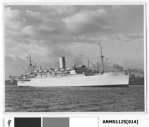 P&O passenger liner STRATHEDEN arriving in Sydney Harbour. A large crane at Garden Island can be seen just astern of the liner.