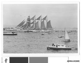 ESMERALDA, a four-masted barquentine of the Chilean Navy, arriving in Sydney escorted by many small craft including Sydney Ferry SYDNEY QUEEN.