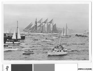 ESMERALDA, a four-masted barquentine of the Chilean Navy, arriving in Sydney Harbour escorted by many small craft including the Sydney Ferry SYDNEY.