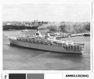 P&O liner ORIANA passing Bennelong Point with the Sydney Opera House in the early stages of construction in the background.