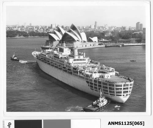 P&O passenger liner ORIANA outward bound from Sydney Harbour and being assisted by two tugboats