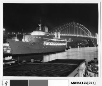 P&O liner CANBERRA moored at Circular Quay with the Sydney Harbour Bridge in the background